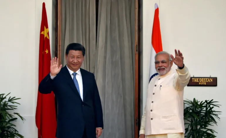 India’s Prime Minister Narendra Modi (R) and China’s President Xi Jinping meet at Hyderabad House in New Delhi, on September 18, 2014