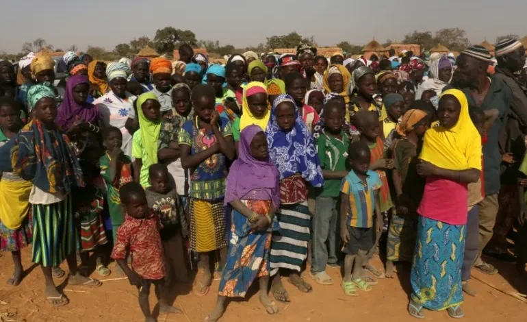 Displaced people wait for help at a village in Dablo area, Burkina Faso