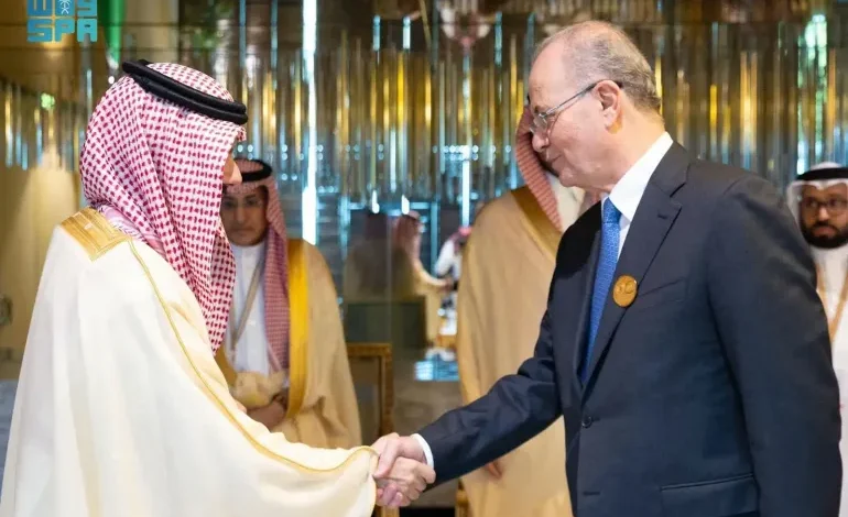 Saudi Minister of Foreign Affairs Prince Faisal bin Farhan Al Saud welcomes Palestinian Prime Minister Mohammad Mustafa ahead of an OIC and Arab League foreign ministers' meeting in Riyadh, November 10, 2024