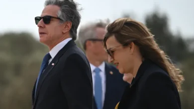 US Secretary of State Antony Blinken walks with the US ambassador to Jordan, Yael Lempert, after arriving in the Red Sea city of Aqaba on December 12, 2024