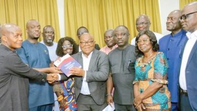 Prof. Mike Oquaye (4th from right), Chairman, NPP 2024 Election Review Committee, presenting the report to Stephen Ayesu Ntim, NPP National Chairman