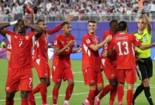 Switzerland were left with 10 men against Argentina after Breel Embolo, left, received a second yellow card for simulation