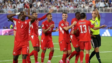 Switzerland were left with 10 men against Argentina after Breel Embolo, left, received a second yellow card for simulation