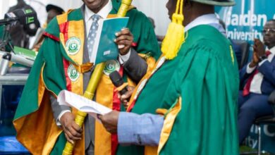 Prof Eric Kwasi Ofori holding his staff of office